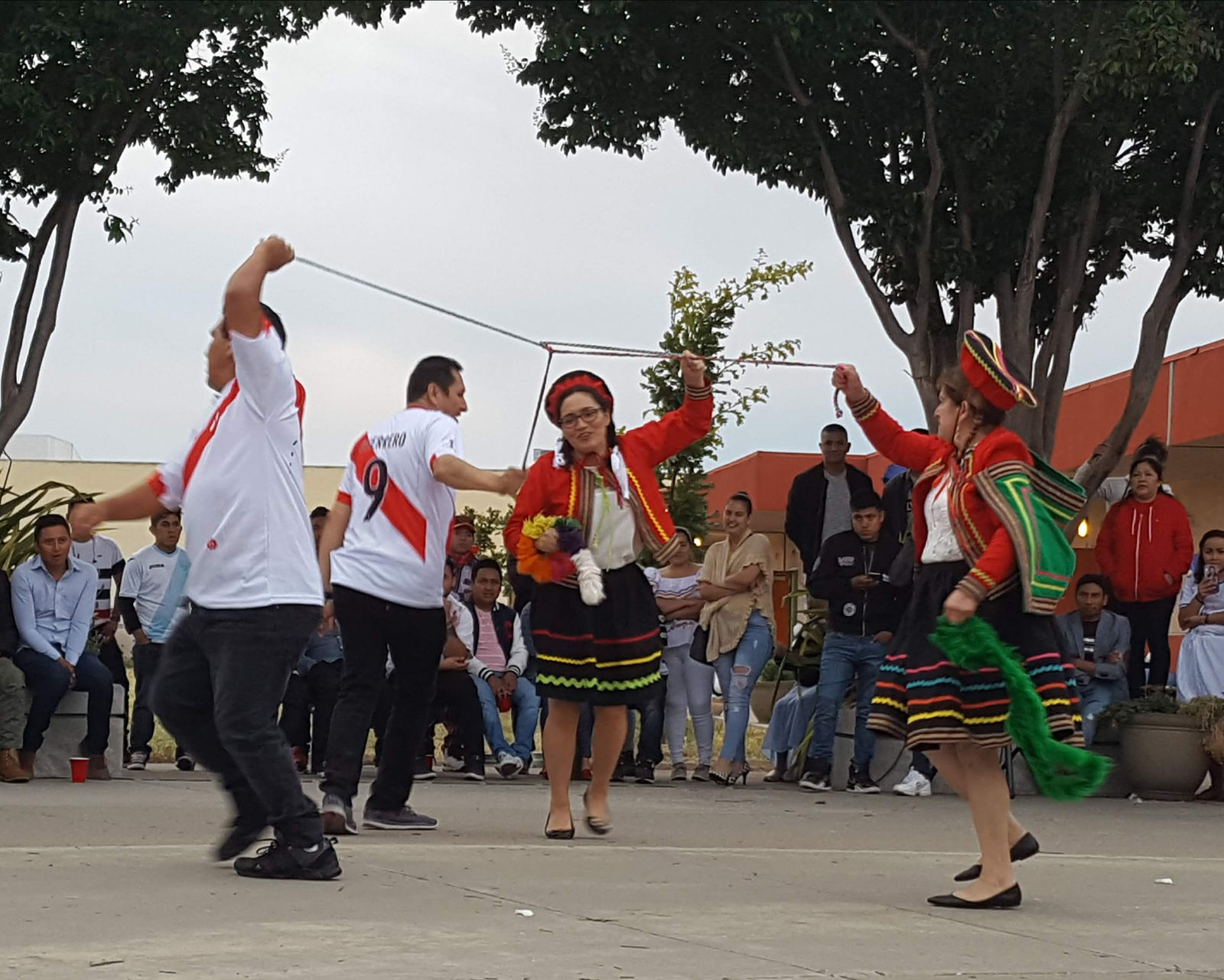 Peruvian students perform a traditional dance at the San Mateo Adult School International Day and Night